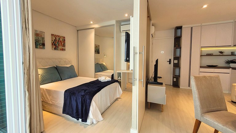 Unique 1307 • Vista lateral para o mar