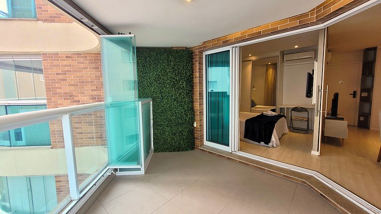 Unique 1307 • Vista lateral para o mar