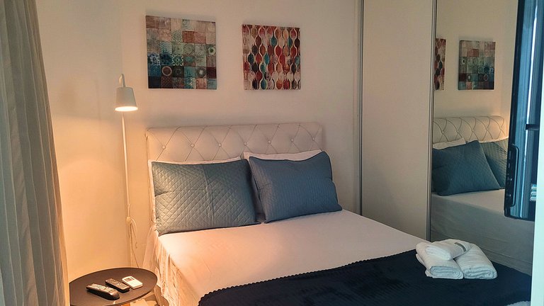 Unique 1307 • Vista lateral para o mar