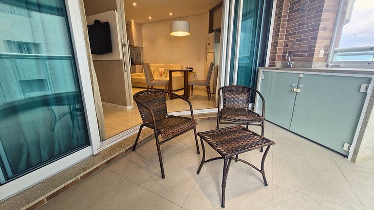 Unique 1307 • Vista lateral para o mar