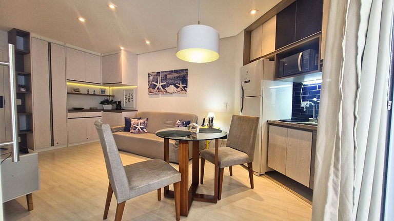 Unique 1307 • Vista lateral para o mar