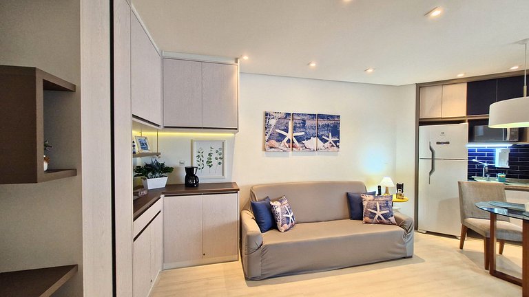 Unique 1307 • Vista lateral para o mar