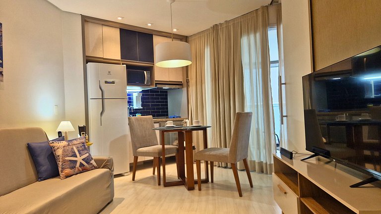 Unique 1307 • Vista lateral para o mar