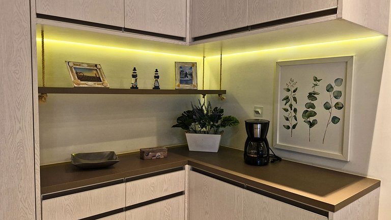 Unique 1307 • Vista lateral para o mar