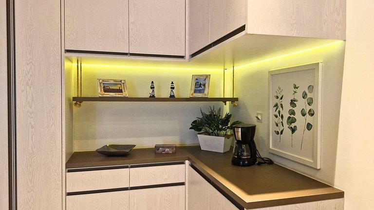 Unique 1307 • Vista lateral para o mar