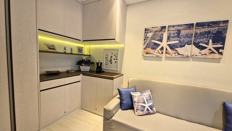 Unique 1307 • Vista lateral para o mar