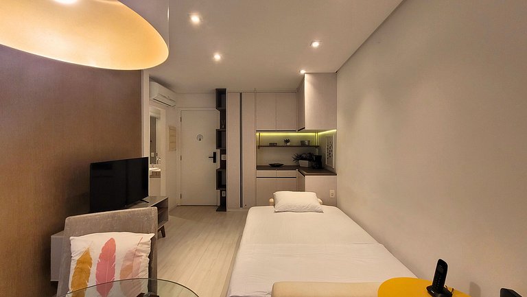 Unique 1307 • Vista lateral para o mar